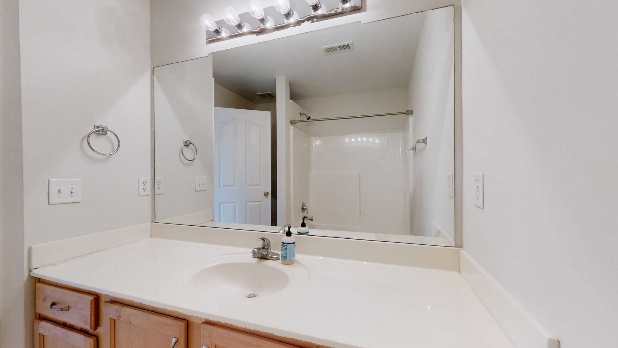 1138 Culpepper Circle Franklin, TN 37064 - Photo 29 of 46 a bathroom with a sink and a mirror