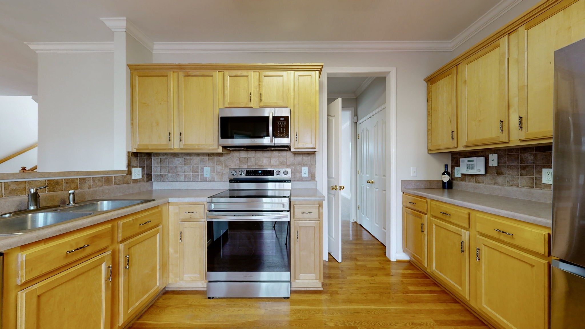 1138 Culpepper Circle Franklin, TN 37064 - Photo 10 of 46 a kitchen with stainless steel appliances granite countertop a stove top oven a sink dishwasher and a refrigerator