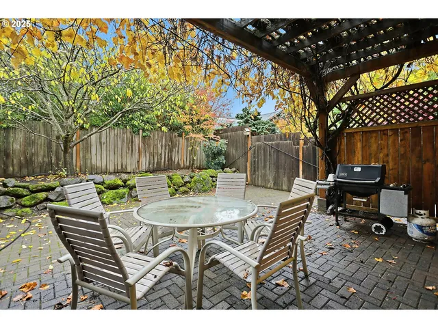 a view of a table and chairs in patio
