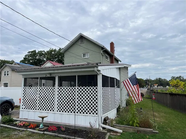 a house view with a garden space