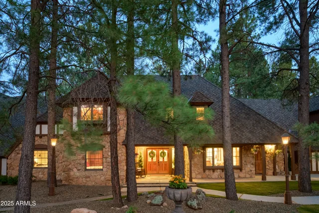 a view of a livingroom with furniture and a window
