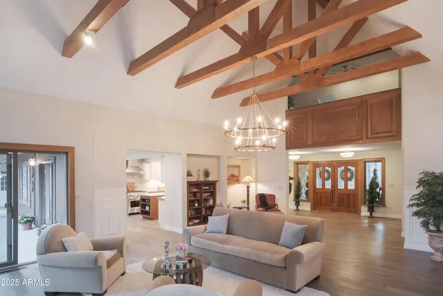 a large kitchen with stainless steel appliances double vanity and a stove