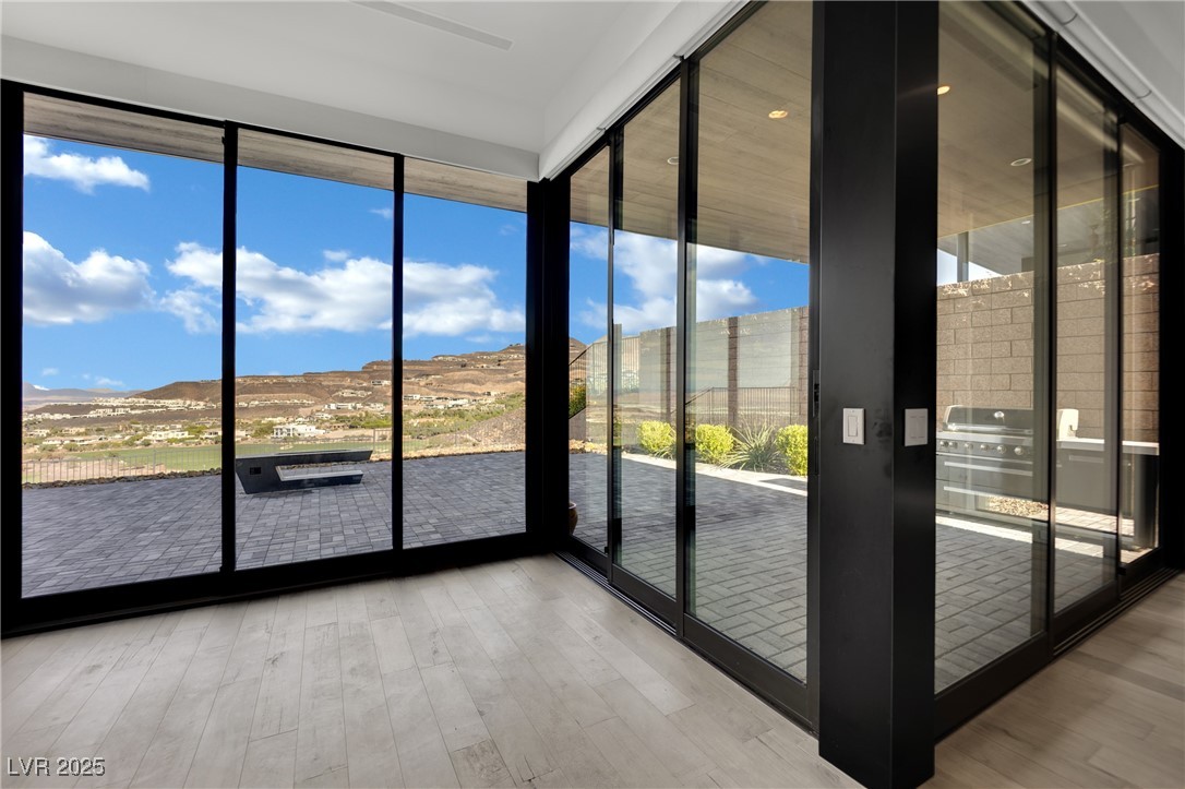658 Falcon Summit Court Henderson, NV 89012 - Photo 24 of 99 Unfurnished sunroom with a mountain view