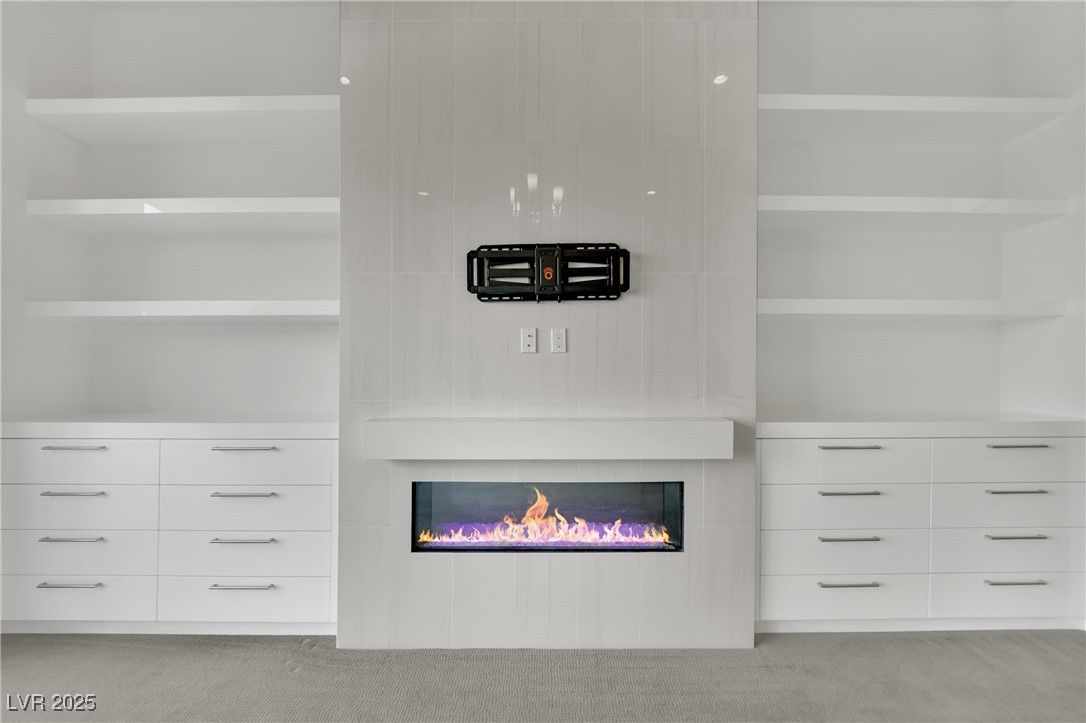 658 Falcon Summit Court Henderson, NV 89012 - Photo 31 of 99 Detailed view of carpet and a fireplace