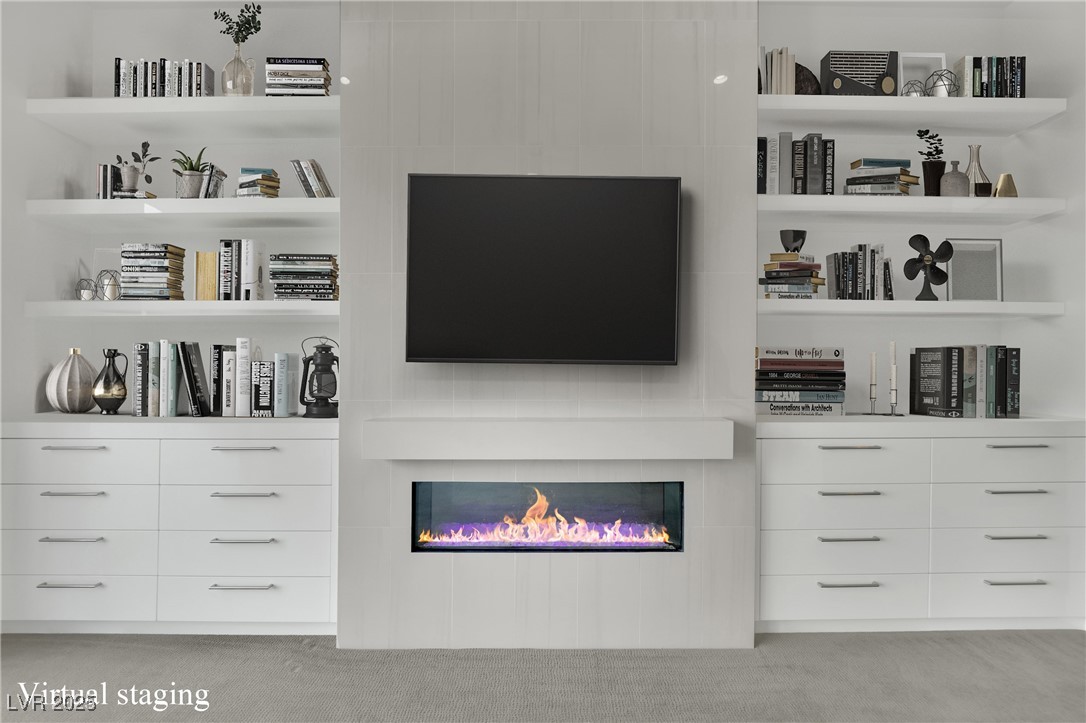 658 Falcon Summit Court Henderson, NV 89012 - Photo 32 of 99 Detailed view of carpet floors and a glass covered fireplace