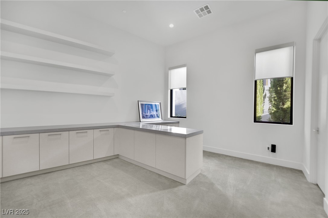 658 Falcon Summit Court Henderson, NV 89012 - Photo 39 of 99 Unfurnished office featuring light carpet and recessed lighting