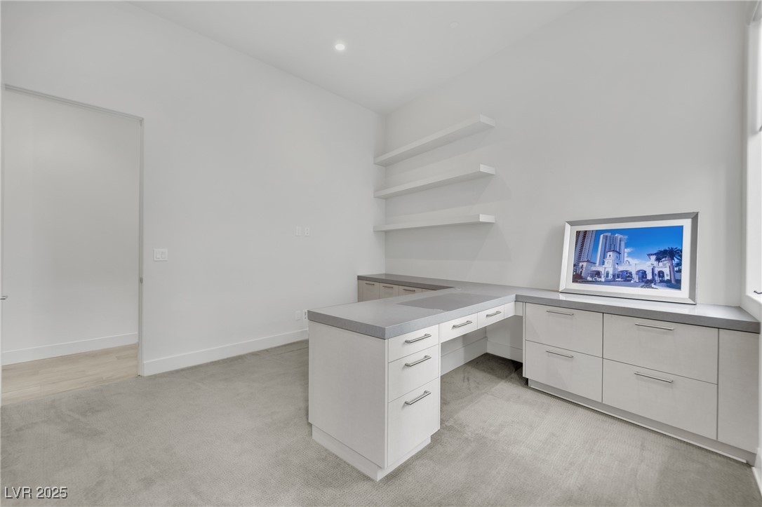 658 Falcon Summit Court Henderson, NV 89012 - Photo 40 of 99 Unfurnished office with light carpet and baseboards