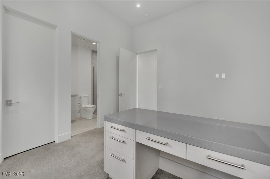 658 Falcon Summit Court Henderson, NV 89012 - Photo 41 of 99 Unfurnished office featuring light colored carpet and recessed lighting