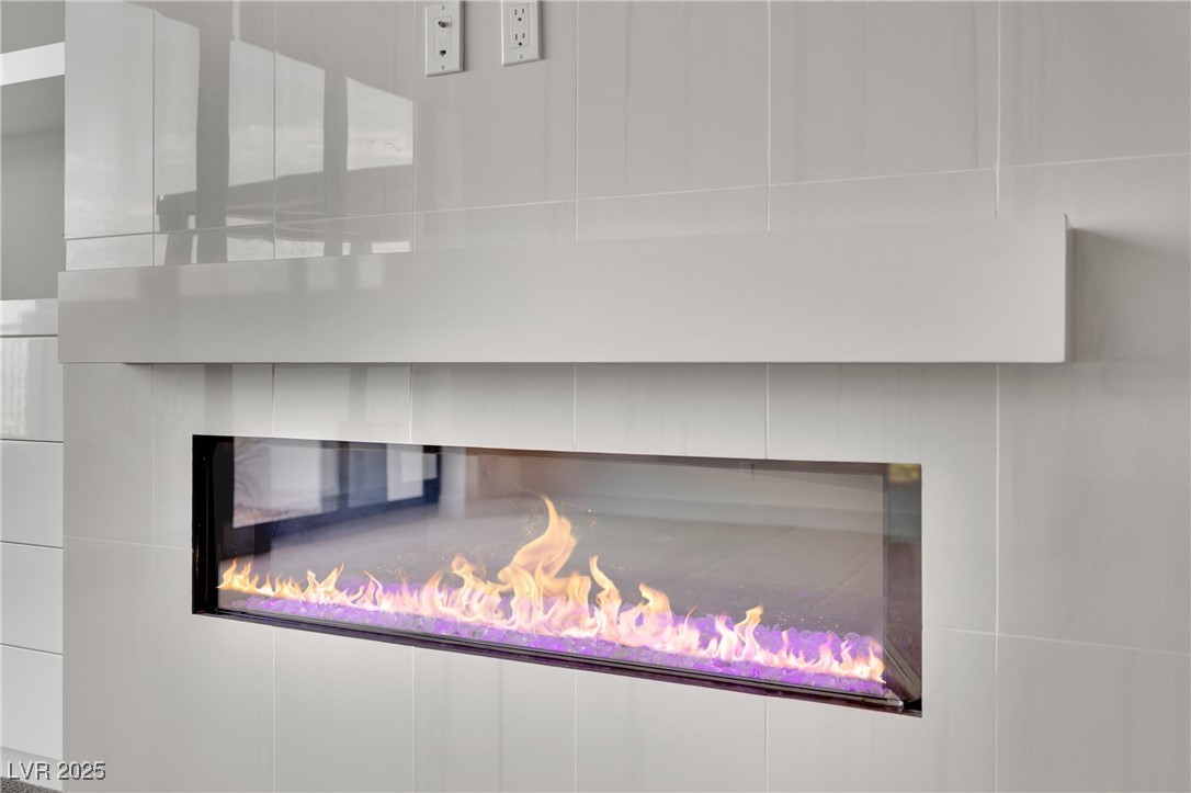 658 Falcon Summit Court Henderson, NV 89012 - Photo 63 of 99 Detailed view of a glass covered fireplace