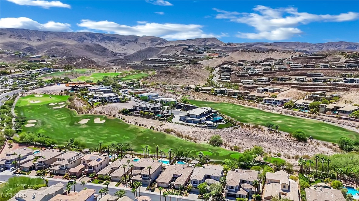 658 Falcon Summit Court Henderson, NV 89012 - Photo 79 of 99 Aerial overview of property's location featuring a golf course and nearby suburban area