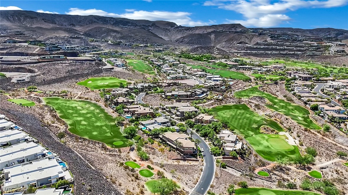 658 Falcon Summit Court Henderson, NV 89012 - Photo 84 of 99 View of mountain background with nearby suburban area and a golf club