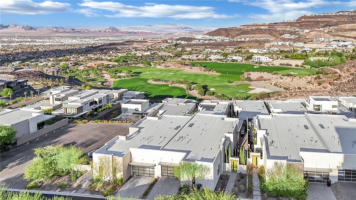658 Falcon Summit Court Henderson, NV 89012 - Photo 91 of 99 Bird's eye view of a local golf course and a mountain backdrop