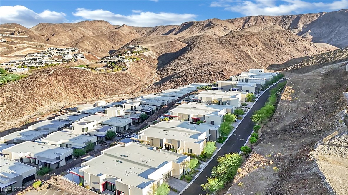 658 Falcon Summit Court Henderson, NV 89012 - Photo 93 of 99 Aerial perspective of suburban area with a mountainous background