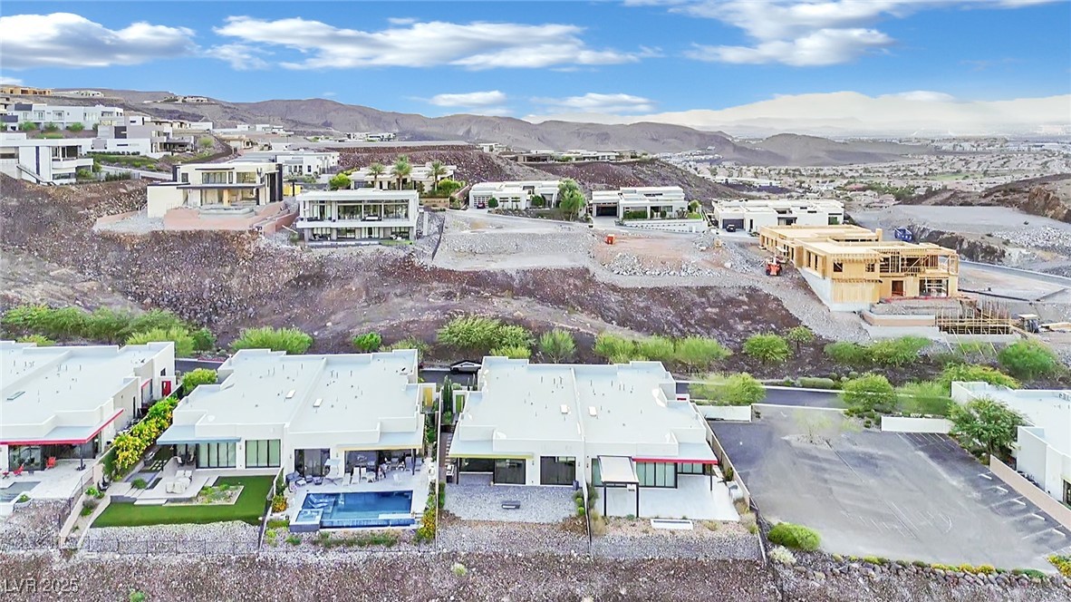 658 Falcon Summit Court Henderson, NV 89012 - Photo 98 of 99 Aerial view of residential area with a mountain backdrop