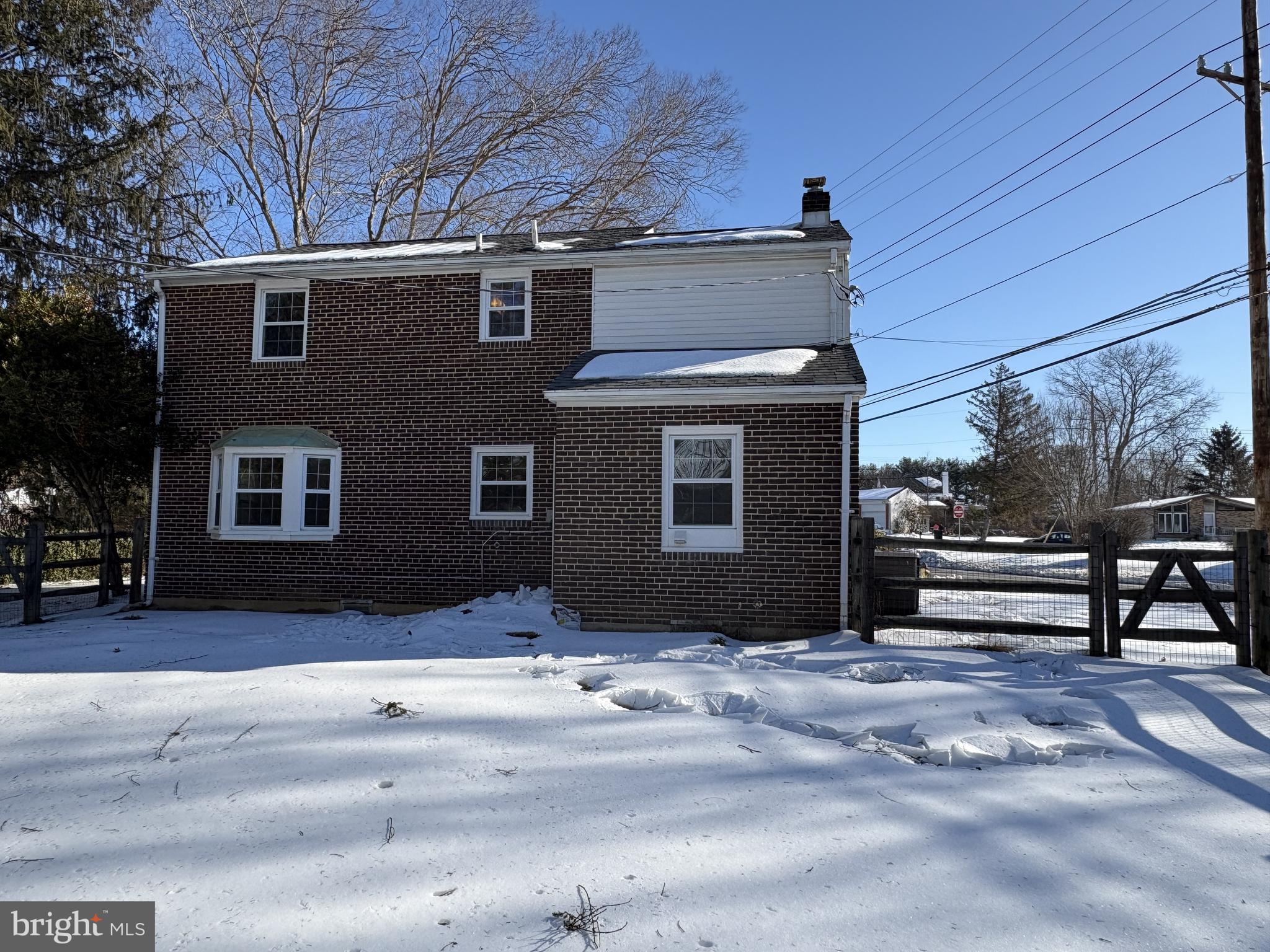 724 Brook Drive Newark, DE 19713 - Photo 19 of 37 a front view of a house with a yard