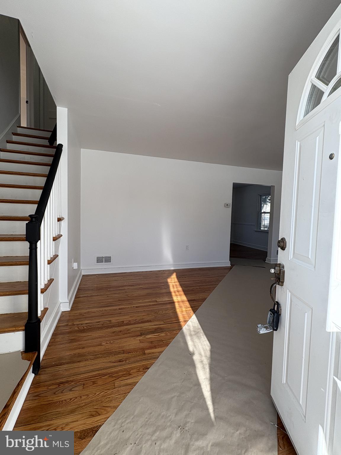 724 Brook Drive Newark, DE 19713 - Photo 2 of 37 a view of wooden floor in an empty room