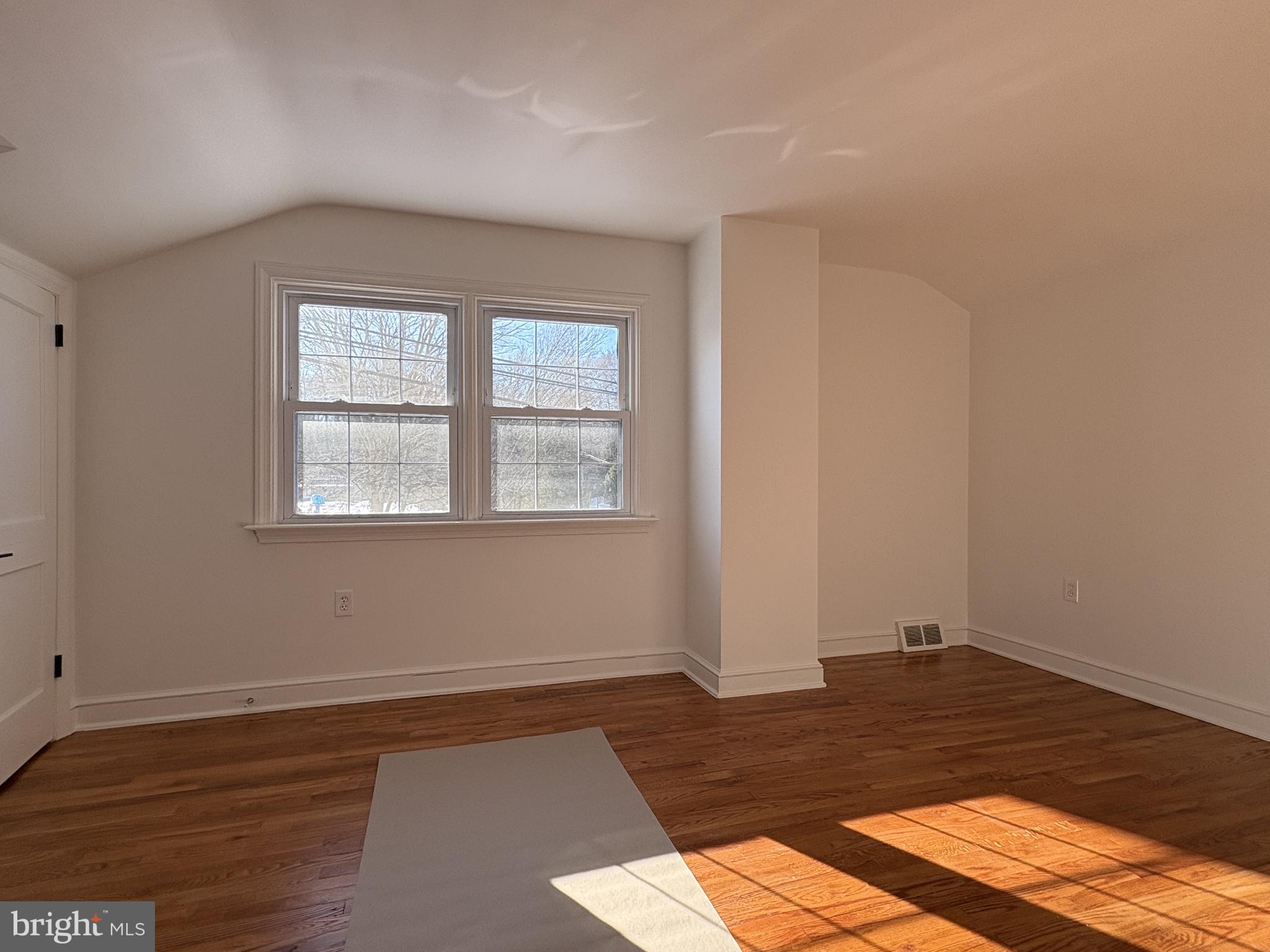 724 Brook Drive Newark, DE 19713 - Photo 32 of 37 a view of a room with wooden floor and cabinet