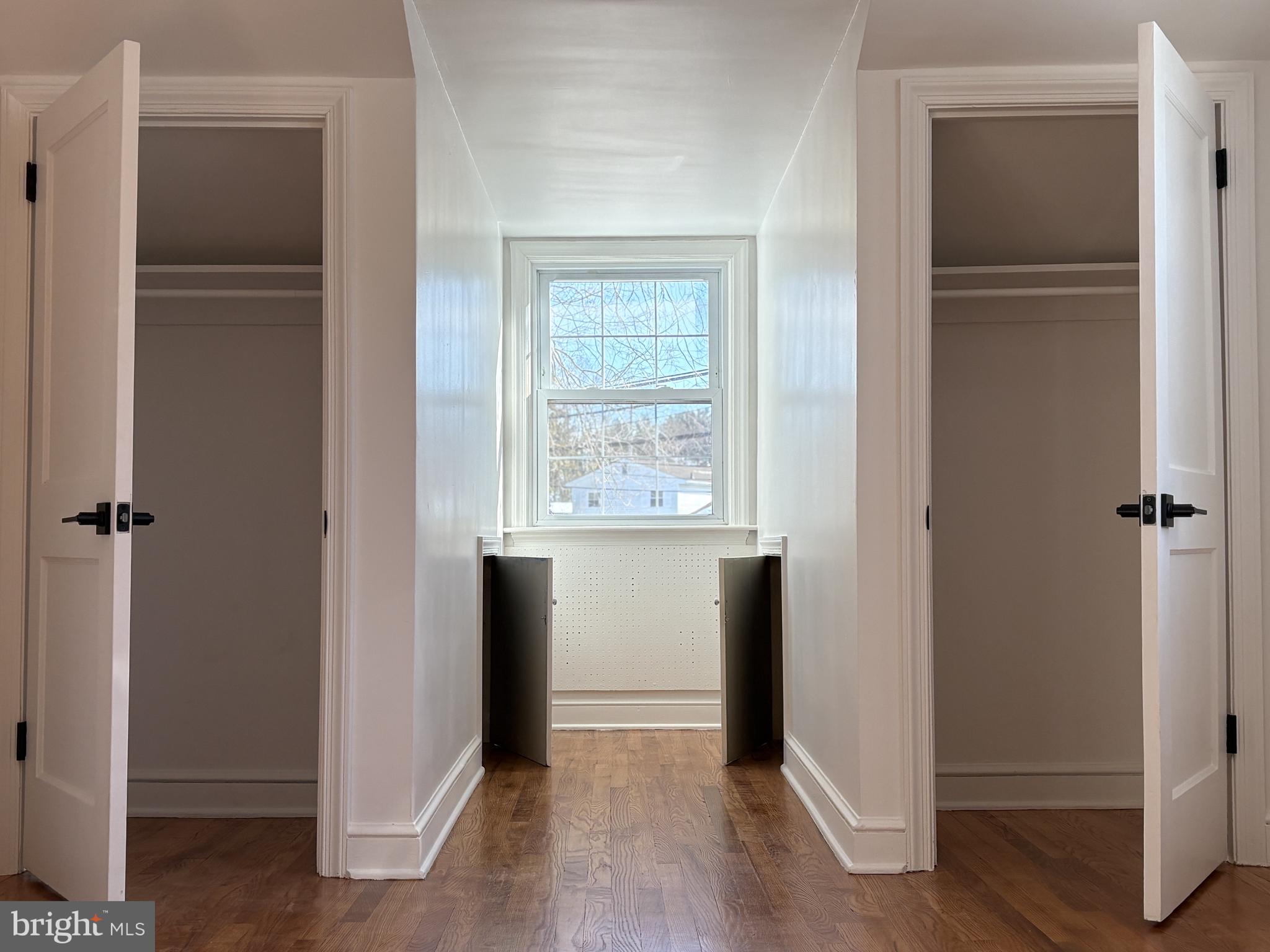 724 Brook Drive Newark, DE 19713 - Photo 34 of 37 a view of walk in closet with hardwood floor