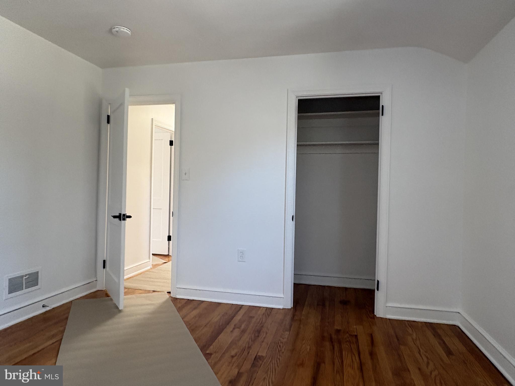 724 Brook Drive Newark, DE 19713 - Photo 37 of 37 a view of an empty room and wooden floor