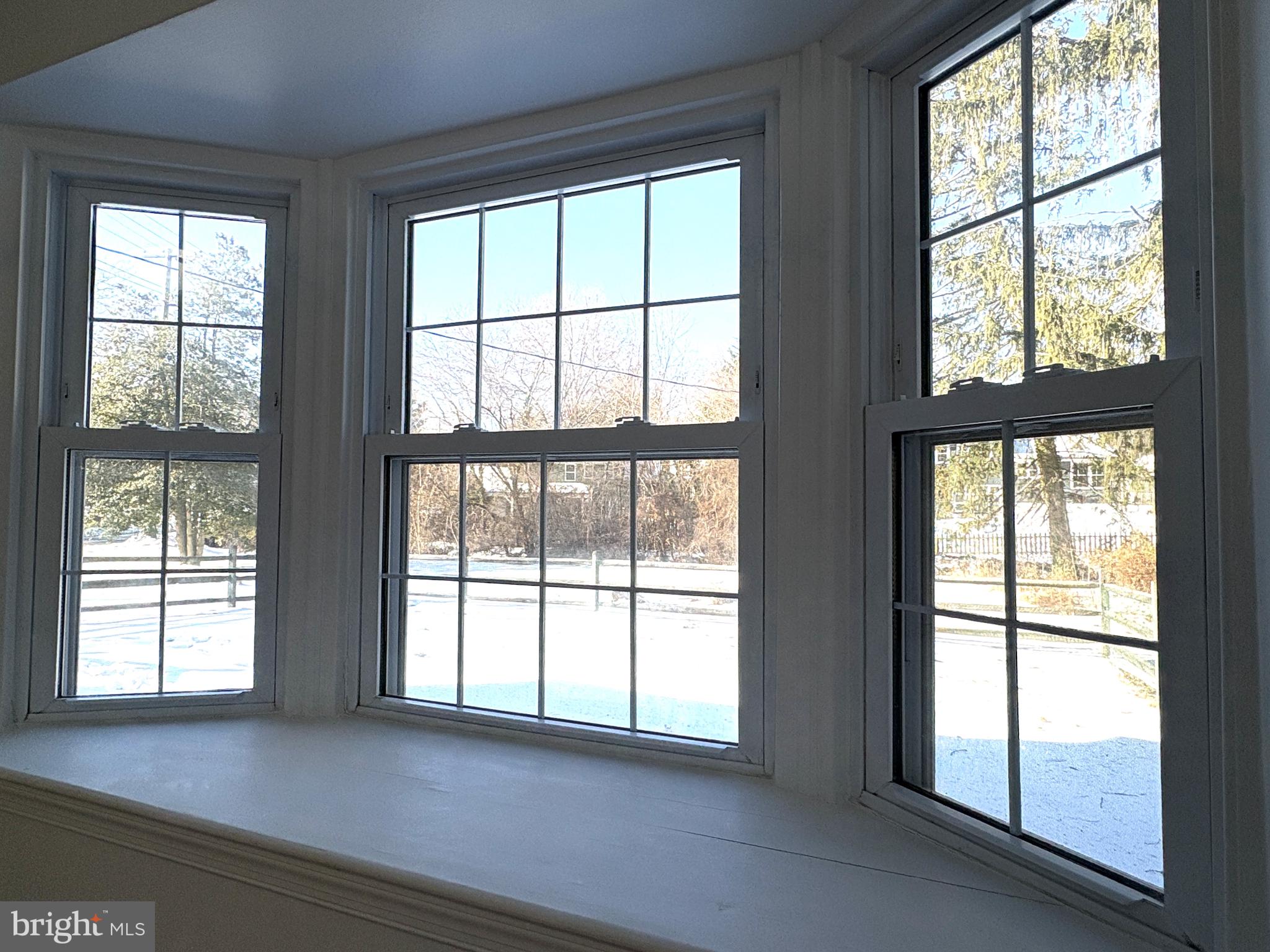 724 Brook Drive Newark, DE 19713 - Photo 8 of 37 an empty room with large windows