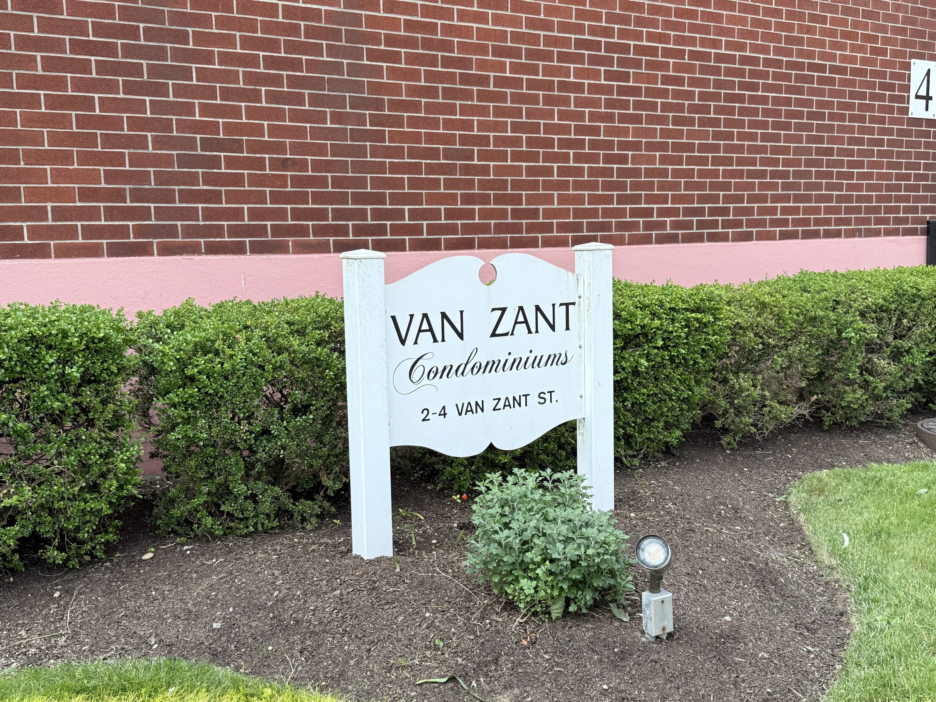 4 Van Zant Street, Unit B8 Norwalk, CT 06855 - Photo 2 of 15 a sign on the side of a building