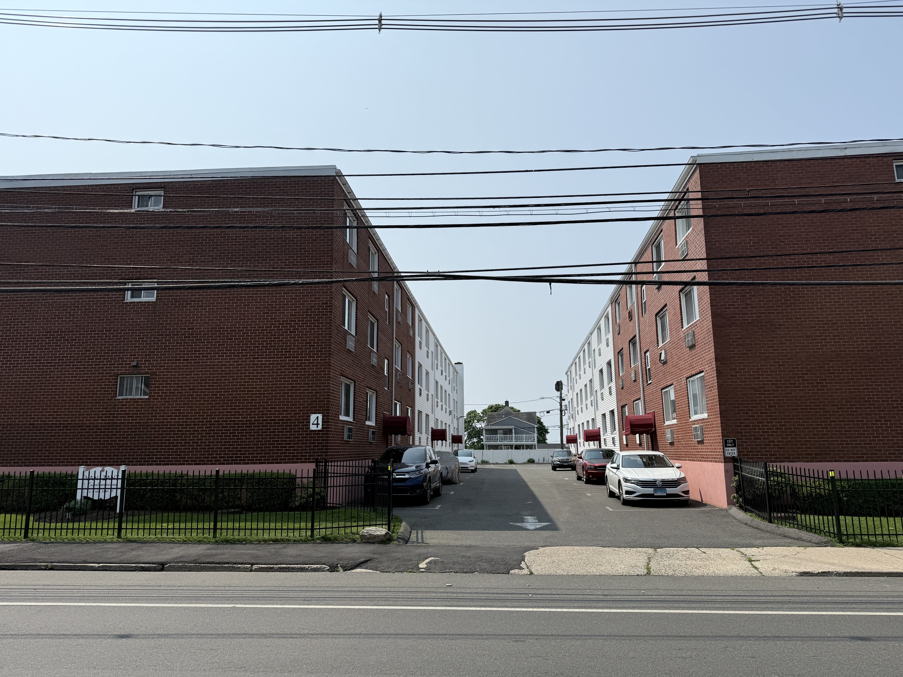 4 Van Zant Street, Unit B8 Norwalk, CT 06855 - Photo 4 of 15 a view of street with cars