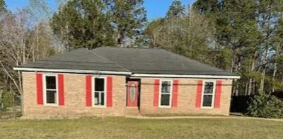 a front view of house with yard