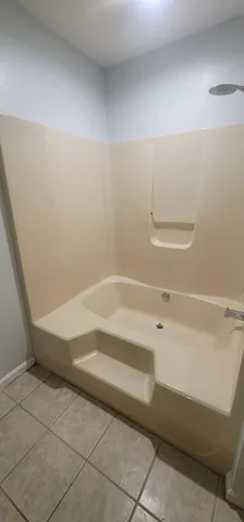 a bathroom with a bathtub