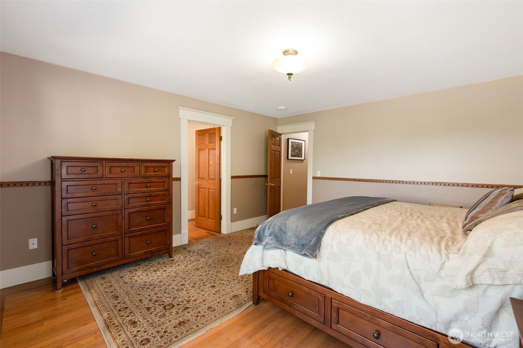 308 Brockway Road Chehalis, WA 98532 - Photo 19 of 40 a bed room with a bed and dresser