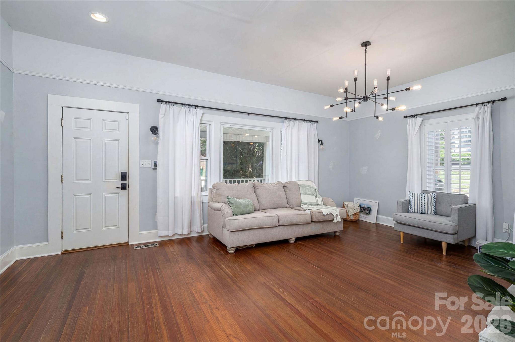 58 Fourth Street Cramerton, NC 28032 - Photo 17 of 44 a living room with furniture and wooden floor