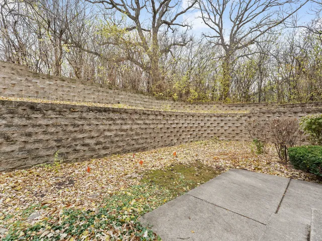 a view of outdoor space with wooden fence