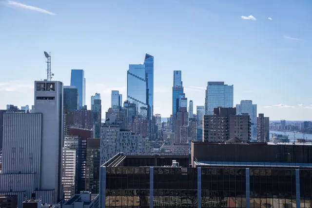 a view of a city with tall buildings