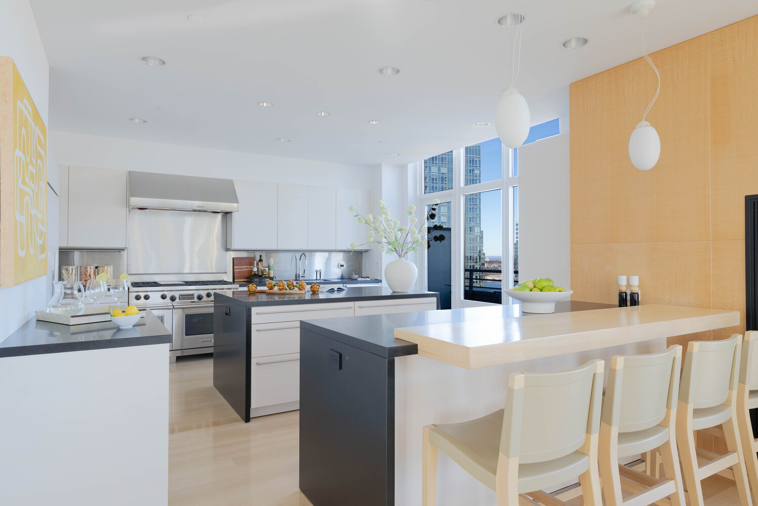 555 West 59th Street, Unit PHC Manhattan, NY 10019 - Photo 13 of 27 a kitchen with appliances a sink and cabinets