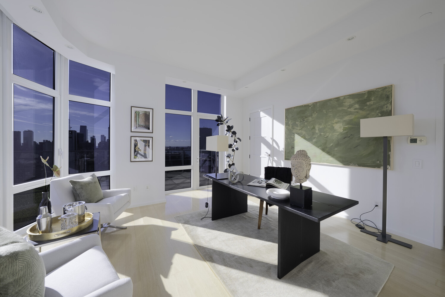 555 West 59th Street, Unit PHC Manhattan, NY 10019 - Photo 23 of 27 a living room with fireplace furniture and a wooden floor