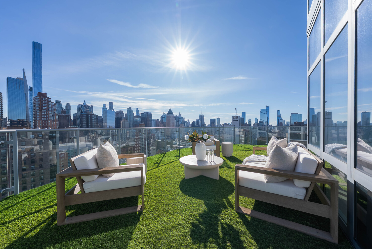 555 West 59th Street, Unit PHC Manhattan, NY 10019 - Photo 3 of 27 a house view with a sitting space and garden view
