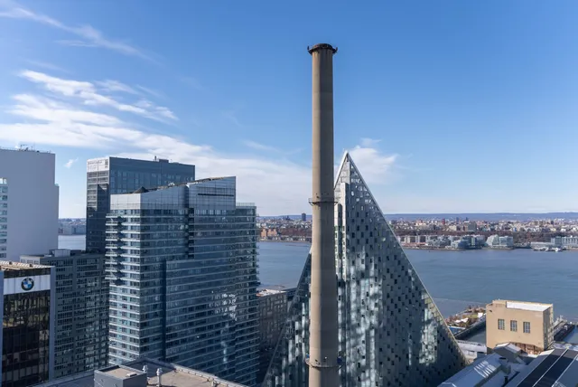 a view of a city with tall buildings