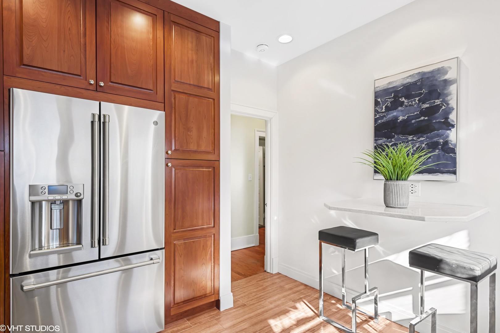 924 Sheridan Road Evanston, IL 60202 - Photo 14 of 34 a kitchen with stainless steel appliances granite countertop a refrigerator and a sink