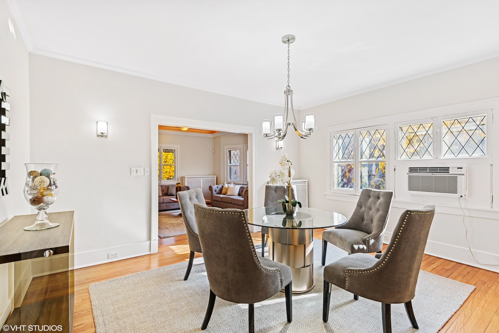 924 Sheridan Road Evanston, IL 60202 - Photo 15 of 34 a view of a dining room with furniture window and wooden floor