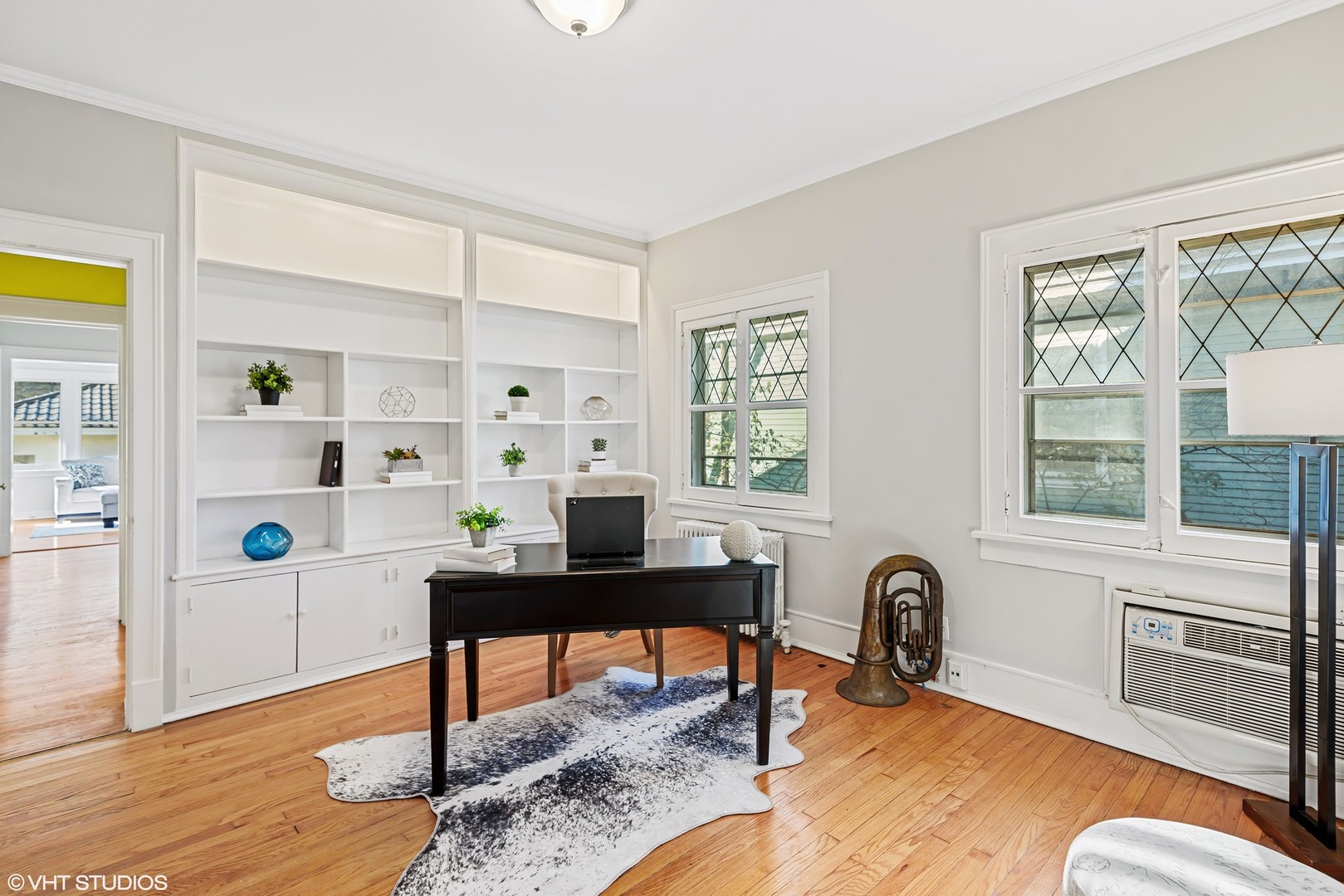 924 Sheridan Road Evanston, IL 60202 - Photo 16 of 34 a view of a workspace with furniture and a window