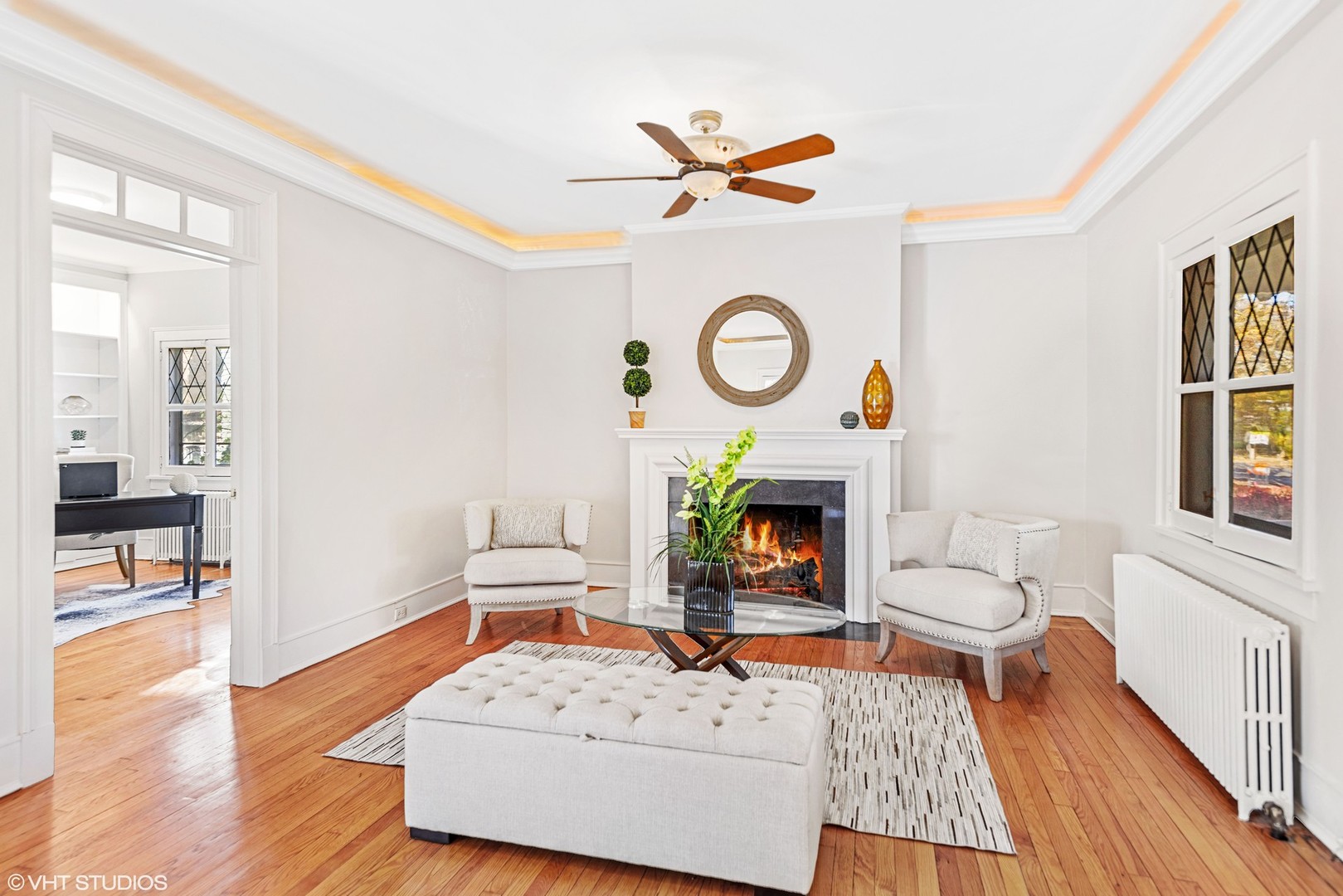 924 Sheridan Road Evanston, IL 60202 - Photo 7 of 34 a living room with furniture and a fireplace