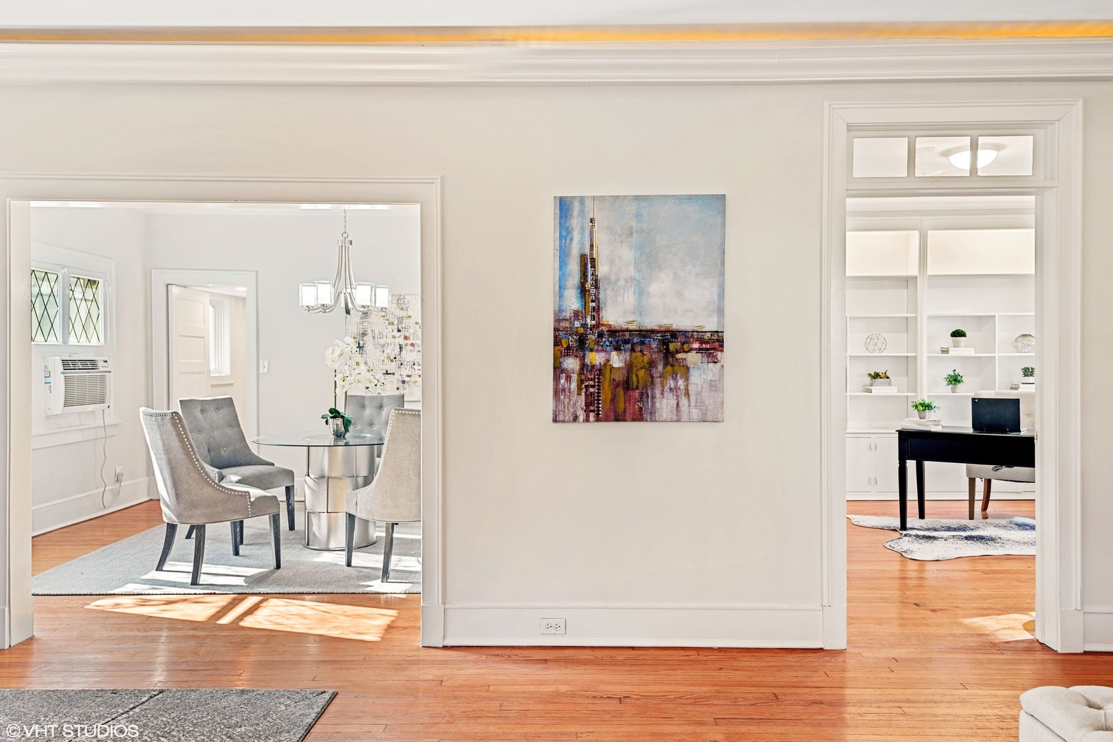 924 Sheridan Road Evanston, IL 60202 - Photo 8 of 34 a view of a livingroom and dining room with wooden floor