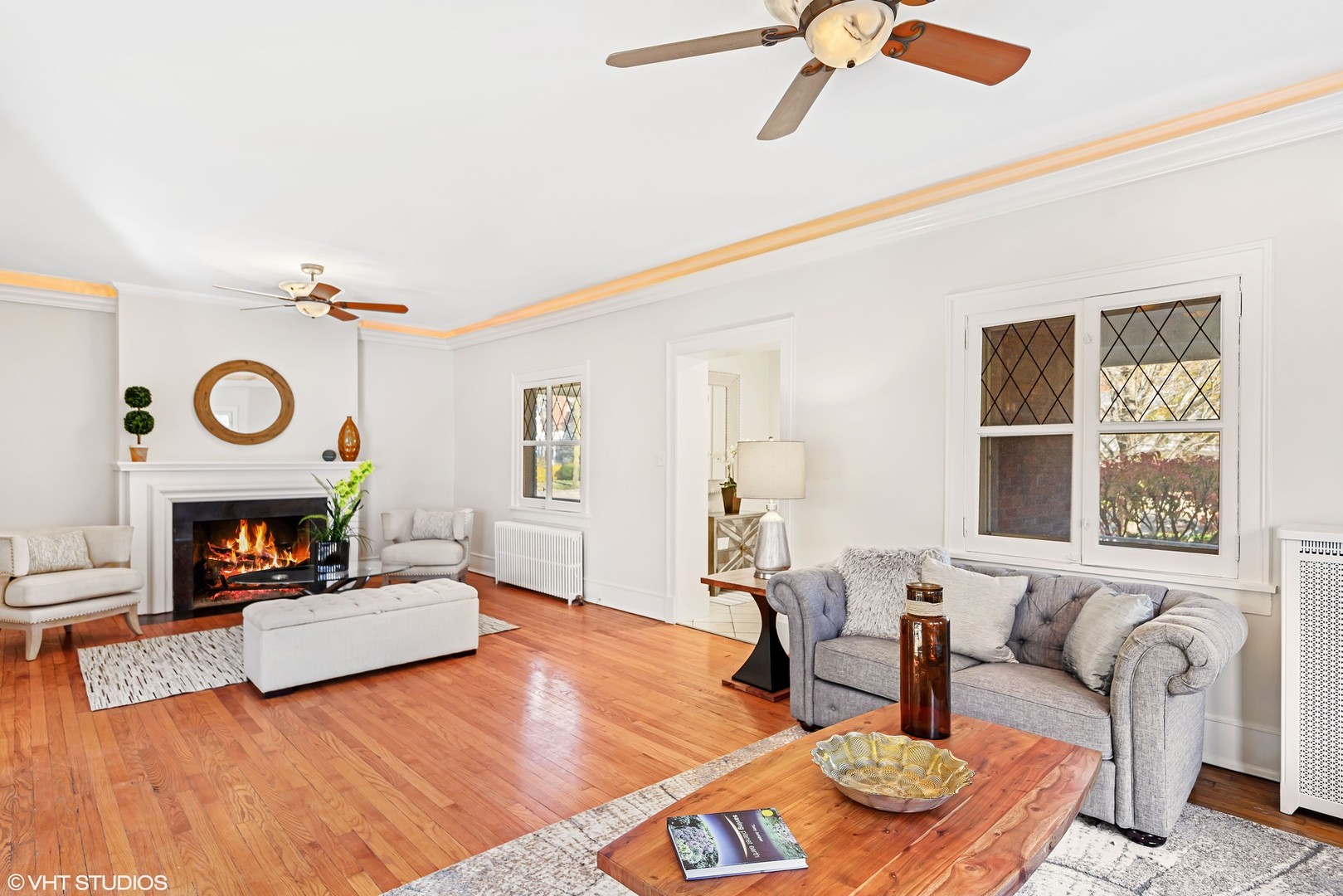924 Sheridan Road Evanston, IL 60202 - Photo 9 of 34 a living room with furniture and a fireplace