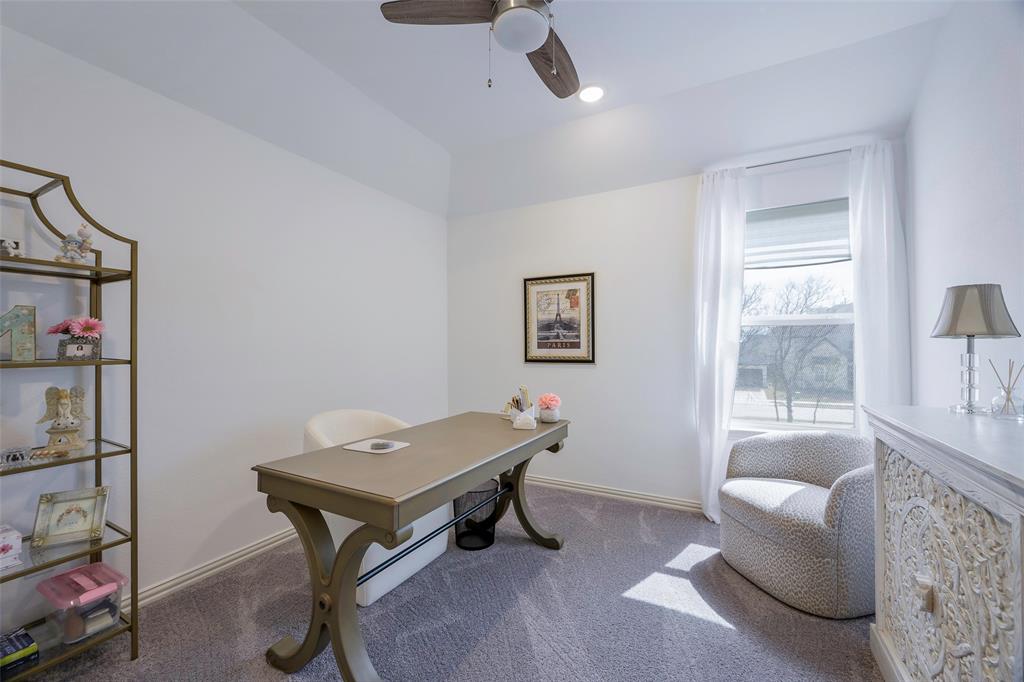 1311 Union Road Celina, TX 75009 - Photo 22 of 38 a view of a workspace with furniture and a window