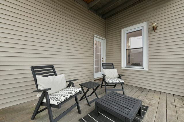 a view of a chairs in a balcony