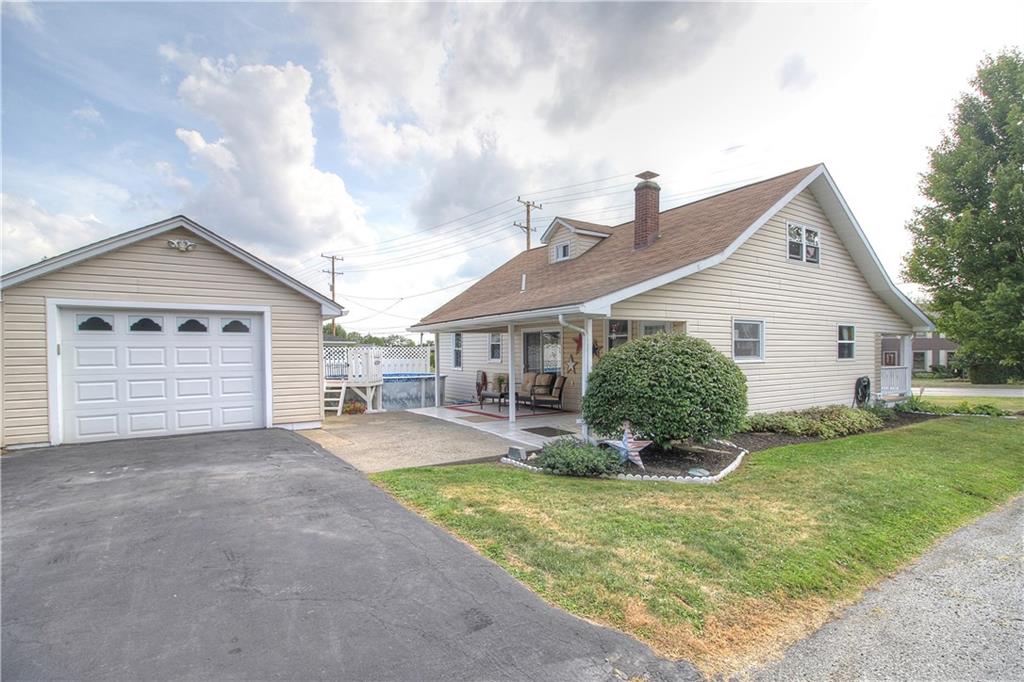 1426 Darlington Road Beaver Falls, PA 15010 - Photo 2 of 25 Rear of home/ detached garage AND an above-ground pool!