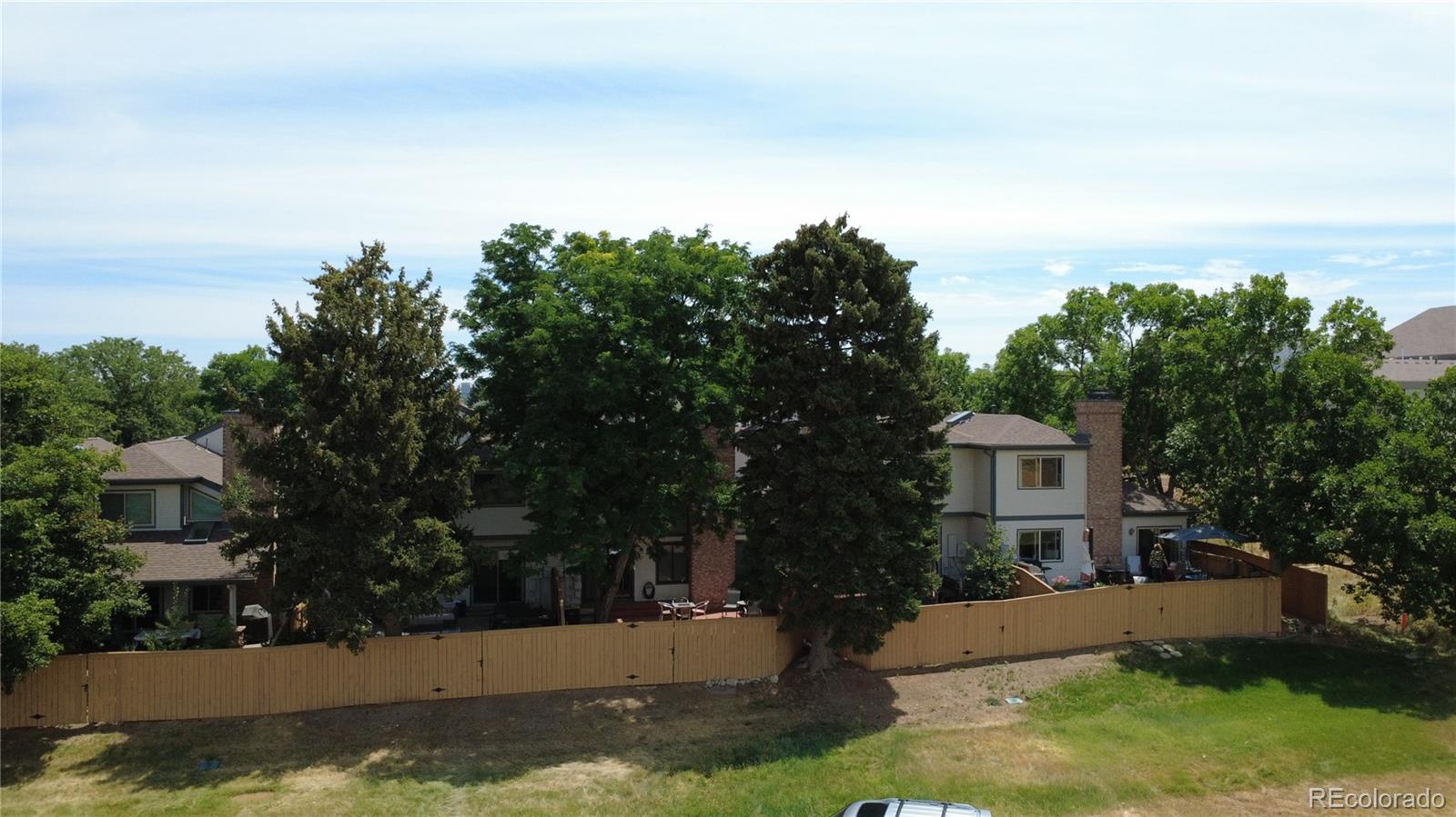 6579 South Jackson Street Centennial, CO 80121 - Photo 28 of 35 a view of house with outdoor space and swimming pool