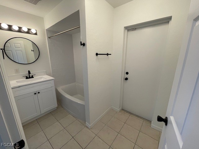 1237 Chrysler Street Lehigh Acres, FL 33974 - Photo 12 of 30 a bathroom with a granite countertop sink a mirror and a shower