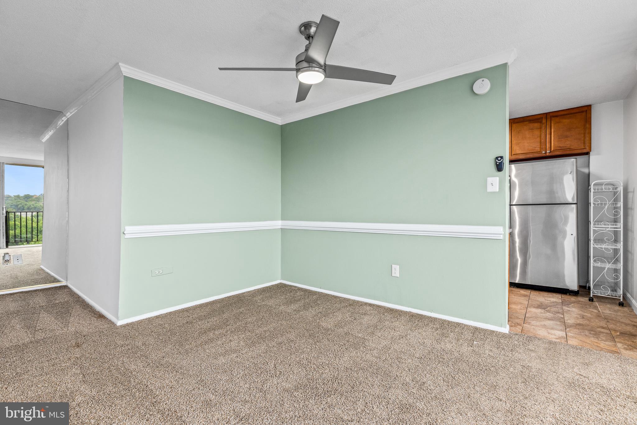 4600 South Four Mile Run Drive, Unit 1142 Arlington, VA 22204 - Photo 11 of 34 a view of a room with a ceiling fan