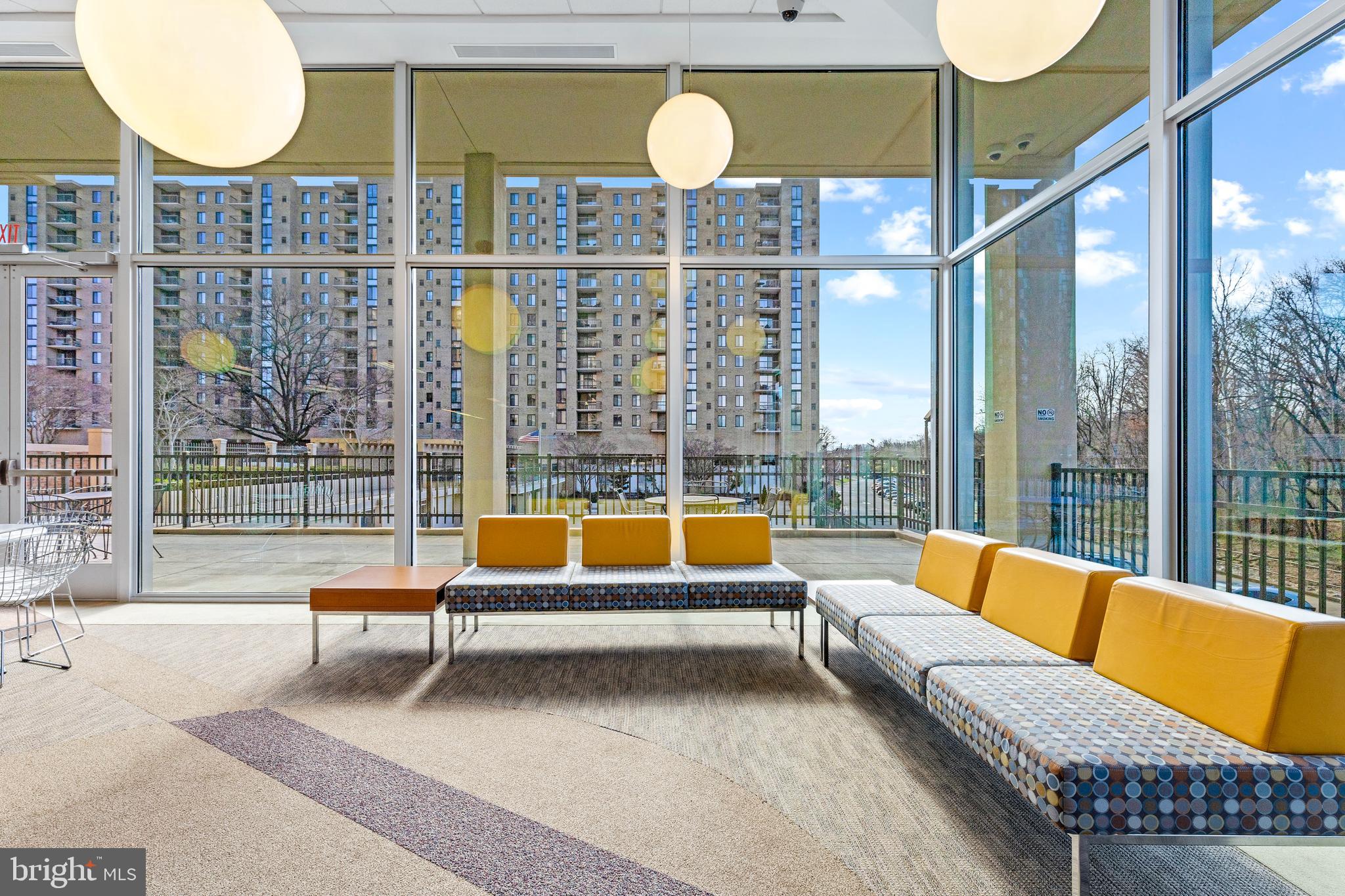 4600 South Four Mile Run Drive, Unit 1142 Arlington, VA 22204 - Photo 28 of 34 a bedroom with furniture and a large window