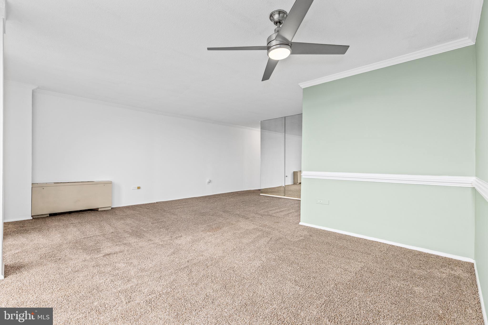 4600 South Four Mile Run Drive, Unit 1142 Arlington, VA 22204 - Photo 10 of 34 a view of an empty room with a window